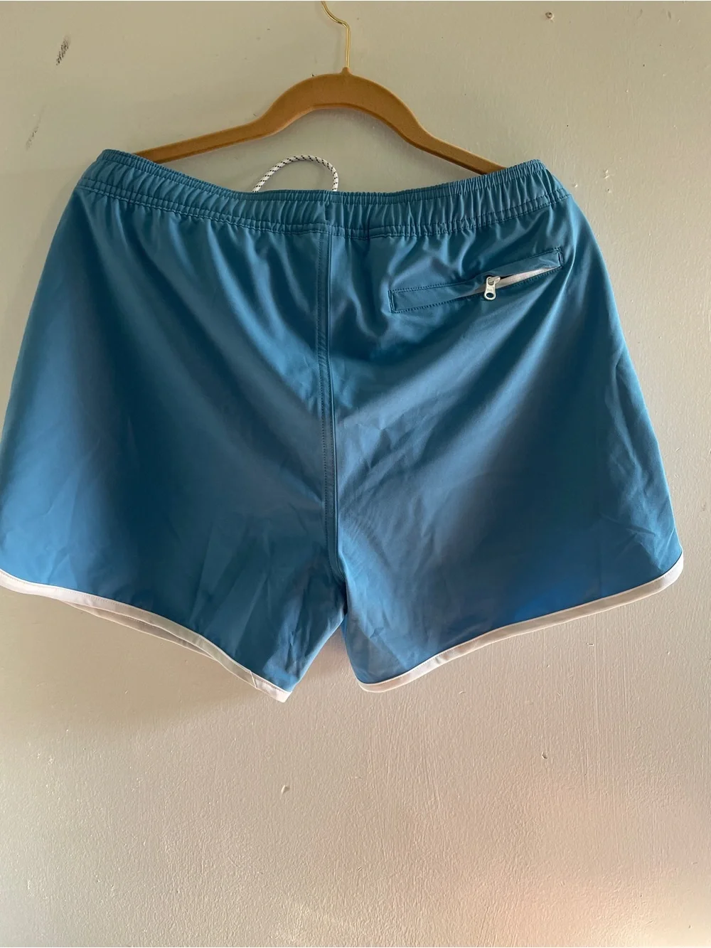 Bonobos Colorful swim trunks with a shorter, curved hem , just like your dad
